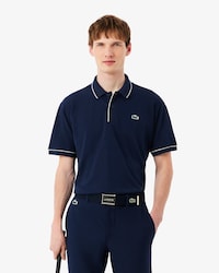 Polo de golf de minipiqu&eacute; termorregulador
