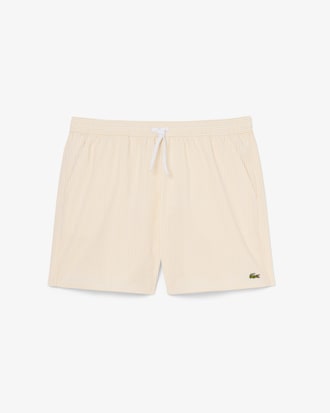 Short de ba&ntilde;o texturizado de rayas de largo medio