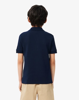 Polo de petit piqu&eacute; con franja en contraste