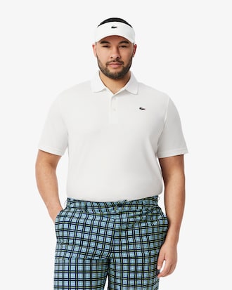 Polo de golf de corte regular con protecci&oacute;n UV