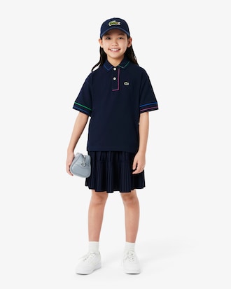 Polo de petit piqué con detalles en contraste