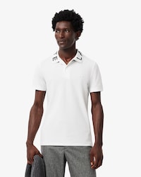 Polo de corte ajustado con detalles de marca en jacquard