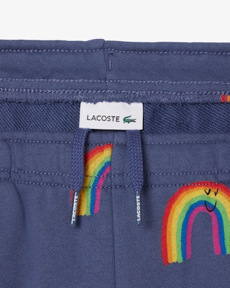 Pantalón corto de felpa con estampado de arco iris