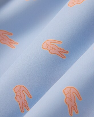 Short de ba&ntilde;o de largo medio con estampado de cocodrilos