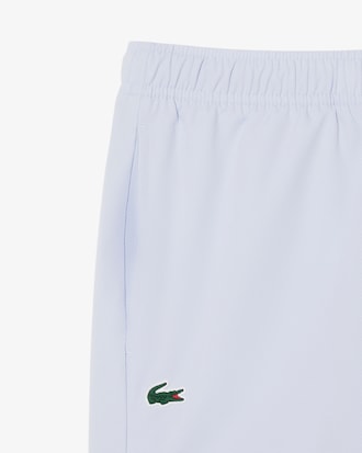 Pantal&oacute;n corto deportivo de tafet&aacute;n de rombos