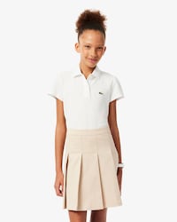Polo de minipiqu&eacute; con cuello festoneado