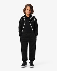 Pantal&oacute;n de ch&aacute;ndal deportivo con raya decorativa