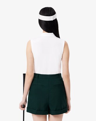 Polo de golf elástico de corte ajustado con protección UV