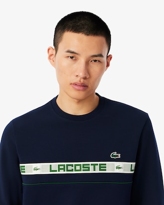 Sudadera de tenis de rayas con detalles de marca