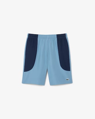 Pantal&oacute;n corto deportivo hidr&oacute;fugo con bloques de color