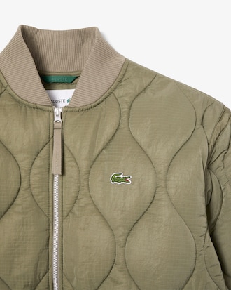 Chaqueta corta con insignia hidrófuga