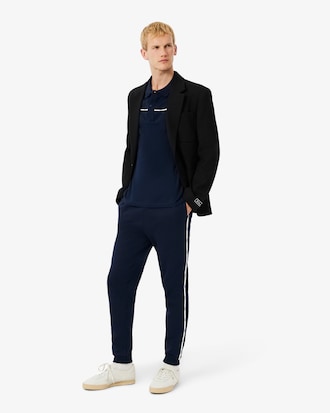 Pantal&oacute;n de ch&aacute;ndal con ribete de logotipo