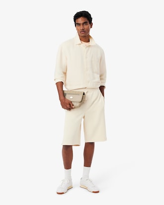 Bolso de mensajero Monogram de piel mini