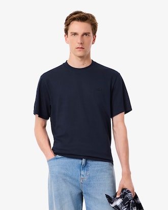 Camiseta con firma bordada