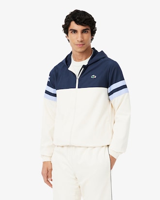 Chaqueta de tenis con capucha hidr&oacute;fuga