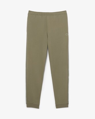 Pantal&oacute;n de ch&aacute;ndal con raya y logotipo