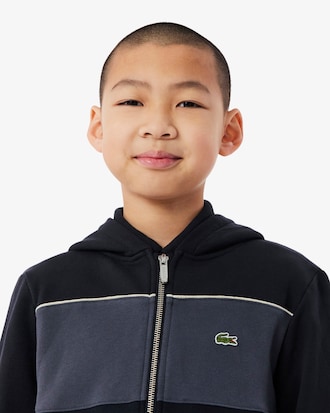 Sudadera con capucha y cremallera con bloques de color