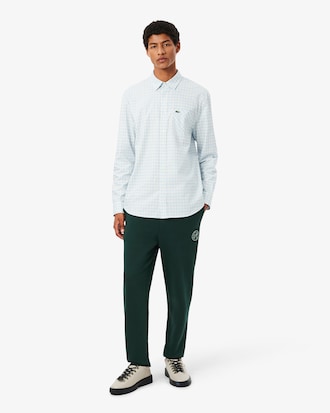 Pantal&oacute;n de ch&aacute;ndal de algod&oacute;n con insignia de tenis