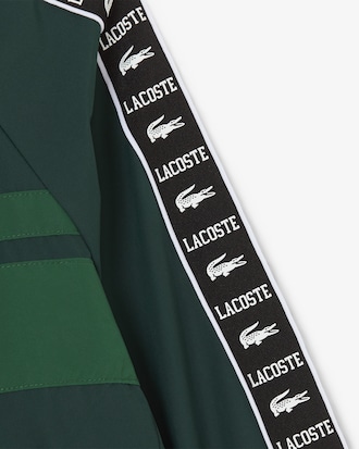 Chaqueta deportiva acolchada con capucha con rayas de logotipo