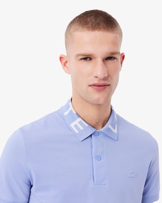 Polo de corte ajustado con detalles de marca en jacquard