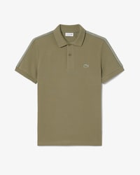 Polo de rayas con logotipo de corte regular