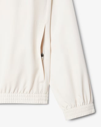 Chaqueta de tenis con capucha hidrófuga