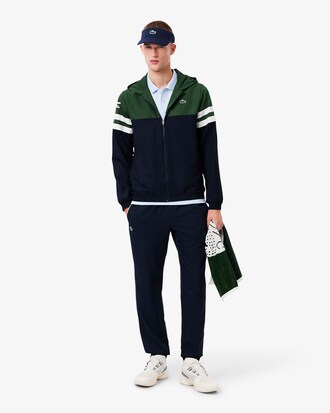 Chaqueta de tenis con capucha hidr&oacute;fuga