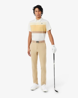 Polo de golf el&aacute;stico con bloques de color Ultra-Dry