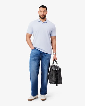 Polo Commuter de piqu&eacute; de corte ajustado con detalles de marca de jacquard