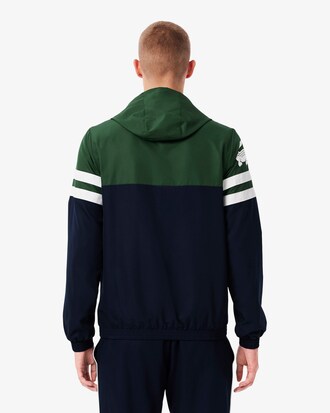 Chaqueta de tenis con capucha hidr&oacute;fuga