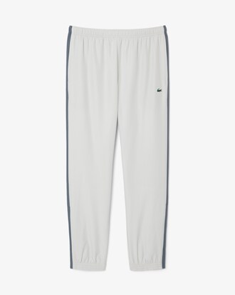 Pantal&oacute;n de ch&aacute;ndal deportivo con bloques de color