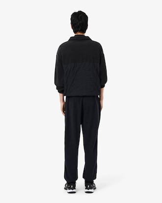 Pantal&oacute;n de ch&aacute;ndal deportivo de dos tejidos