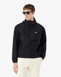 Chaqueta replegable ligera hidr&oacute;fuga