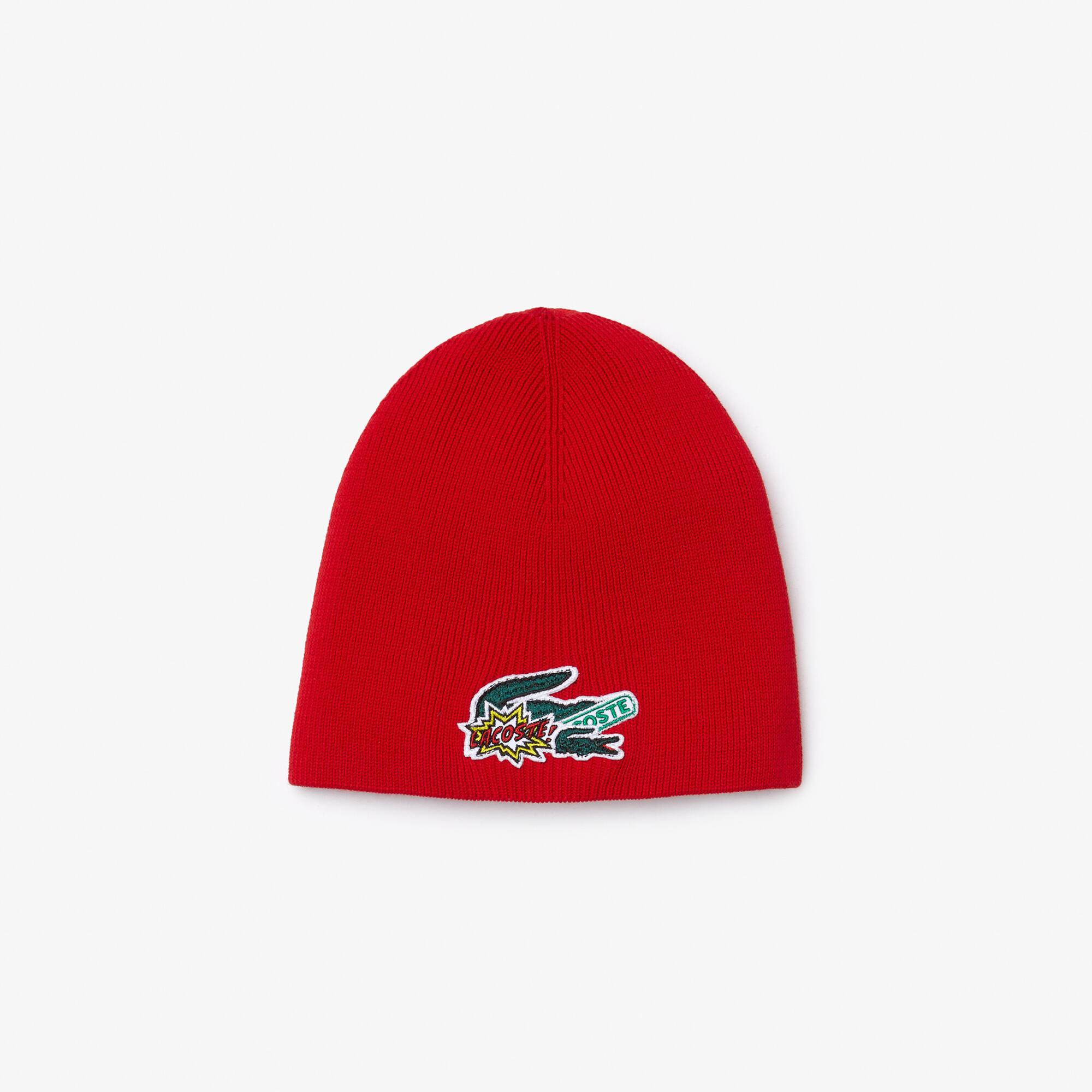 Lacoste Gorro infantil Lacoste Holiday con insignia de efecto cómic. 1