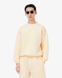 Sudadera con estampado exclusivo y bordada de corte holgado
