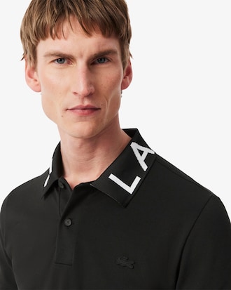 Polo de corte ajustado con detalles de marca en jacquard