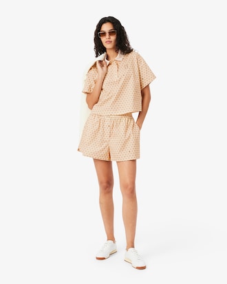 Polo oversize con estampado de tenis