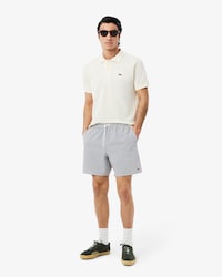 Short de baño texturizado de rayas de largo medio
