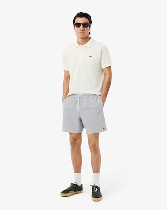 Short de baño texturizado de rayas de largo medio