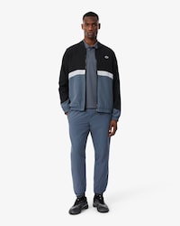 Ch&aacute;ndal deportivo con bloques de color estampados
