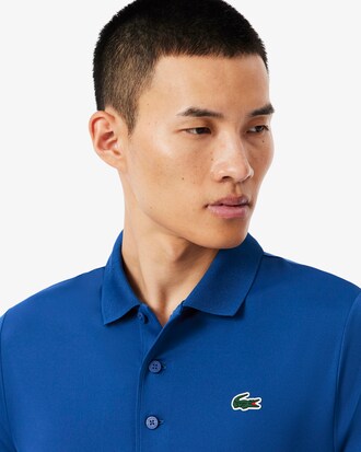 Polo de golf de corte regular con protecci&oacute;n UV