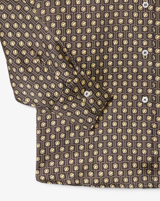 Camisa de sat&eacute;n oversized con estampado