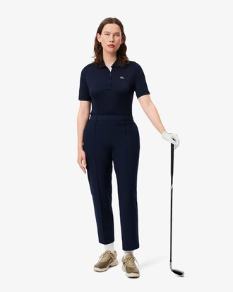 Polo de golf el&aacute;stico de corte ajustado con protecci&oacute;n UV