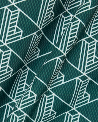 Short de ba&ntilde;o de largo medio con estampado de monograma