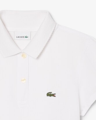Polo de minipiqu&eacute; con cuello festoneado