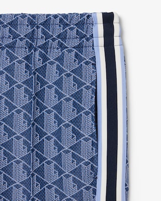 Pantal&oacute;n de ch&aacute;ndal acampanado con monograma