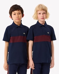 Polo de petit piqué con franja en contraste