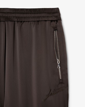 Pantal&oacute;n deportivo satinado oversized