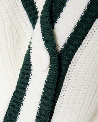 Chaqueta de punto de golf de mezcla de lana con insignia