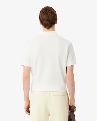 Polo de piqu&eacute; de corte cl&aacute;sico con insignia en contraste